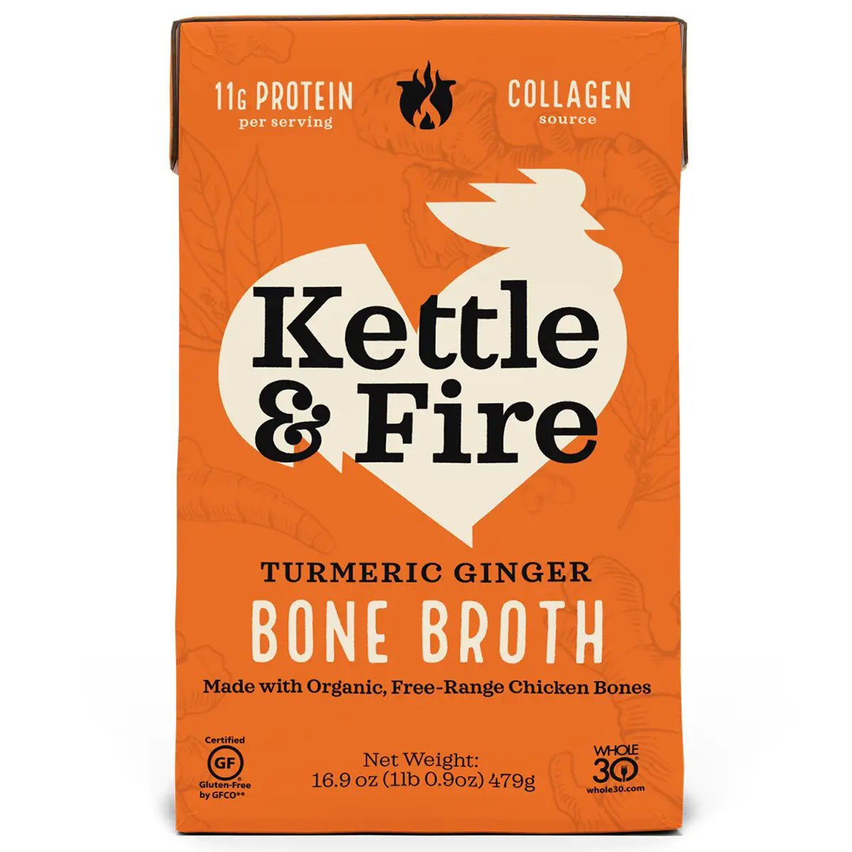 An orange rectangular carton labeled "KETTLE &amp; FIRE - TURMERIC GINGER BONE BROTH" from the brand Kettle &amp; Fire, made with organic, free-range chicken bones and infused with organic ginger. It weighs 16.9 oz (1lb 0.9 oz) and contains 11g of protein per serving. The packaging displays gluten-free, Whole30, and collagen labels.