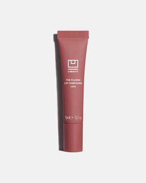 A light gray tube of U BEAUTY THE PLASMA LIP COMPOUND 15ML stands upright with white text and logo, highlighting this hydrating lip treatment and plumper against a white background.