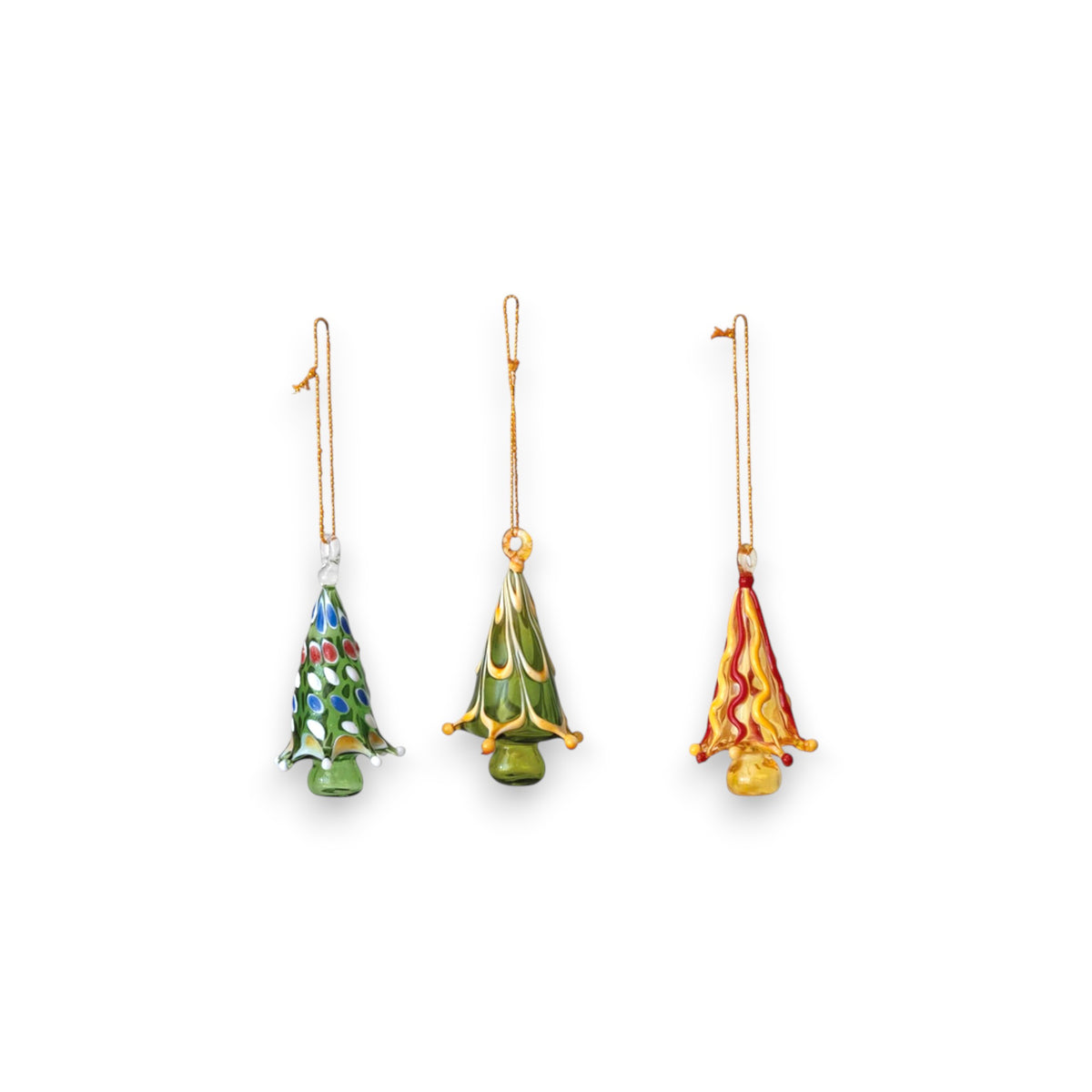 Three handmade CREATIVE COOP GLASS TREE ORNAMENTS, each featuring a unique design and gold hanging string, are displayed on a white background.