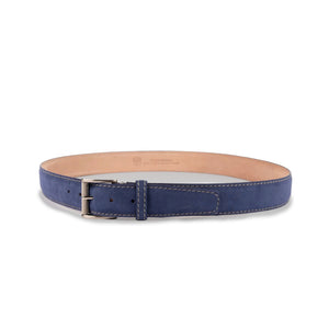 The LEN LIFESTYLE L.E.N. LIFESTYLE - ALCANTARA BELT IN BLUE JEAN features blue suede, white stitching, a silver buckle, and tan lining, displayed in a circular shape on a white background.