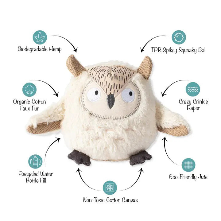 The PET SHOP BY FRINGE STUDIO&#39;s WHOOOO&#39;S THERE OWL DOG TOY is a plush owl made from sustainable, recycled materials. This eco-friendly toy features biodegradable hemp, a TPR spiky squeaky ball, organic cotton faux fur, crazy crinkle paper, jute, non-toxic cotton canvas, and recycled water bottle fill.
