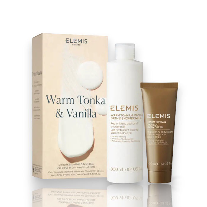 A beige box with the ELEMIS - STEINER logo at the top and "Warm Tonka &amp; Vanilla" written below in large text. The bottom of the box mentions "Limited Edition Body Duo." The box features an abstract white paint design in the background, evoking a touch of British wilderness.