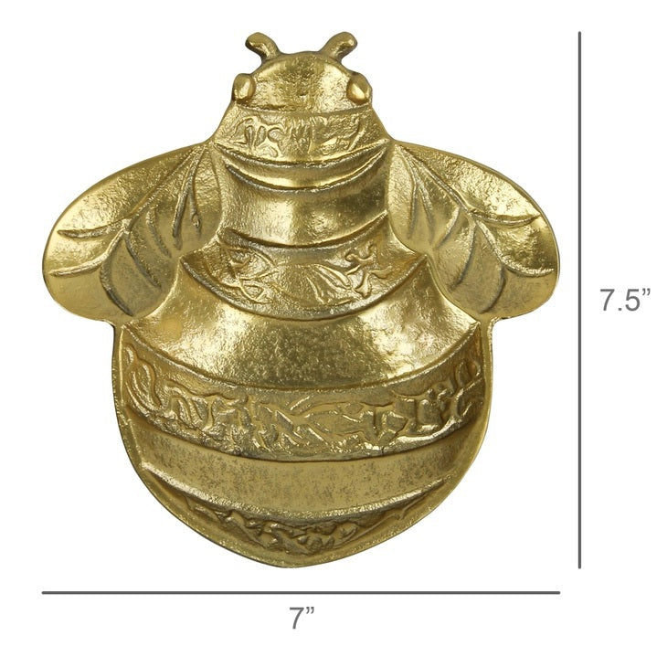 The HOMART GOLD BEE TRAY features a shiny, gold-toned metal bee with engraved details—ideal for display or as a unique jewelry holder.