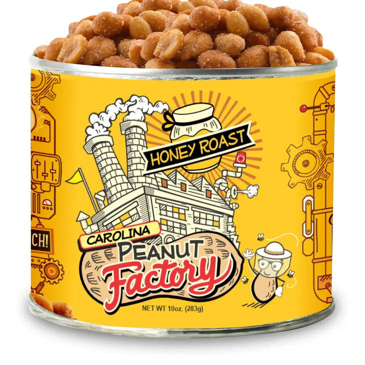 A vibrant, cylindrical tin labeled &quot;1949 NUT COMPANY&quot; contains delicious honey roasted peanuts. The label features playful illustrations of a factory, a vintage peanut mascot, and machinery. The tin weighs 10oz (283g) and is predominantly yellow with black and red accents.