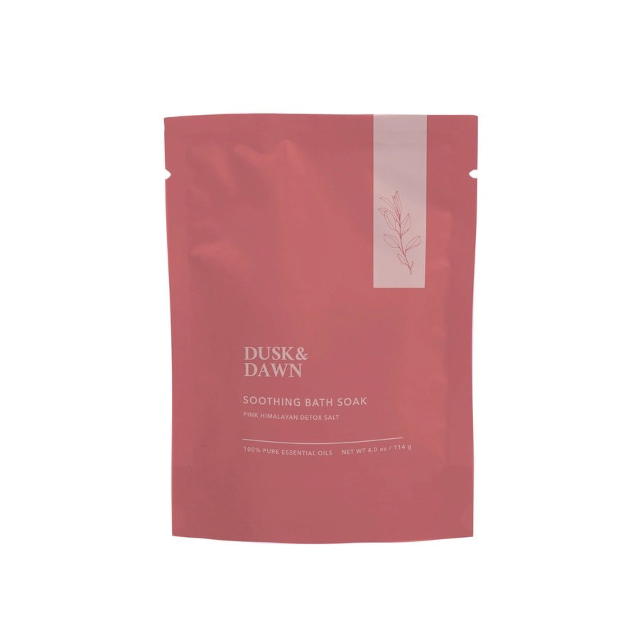 A pink resealable pouch labeled "GIFTEN MARKET SOOTHING BATH SOAK WITH PINK HIMALAYAN SALT," featuring 100% pure essential oils and minimalistic floral line art on the upper right.