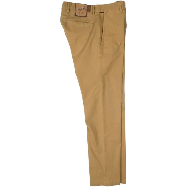 Close-up of PENNBILT - THE PLAINSMAN PANT IN DARK KHAKI, featuring tan Pima cotton fabric with a partially unzipped brass zipper and an open button. A blue “PENNBILT” label is sewn near the waistband.