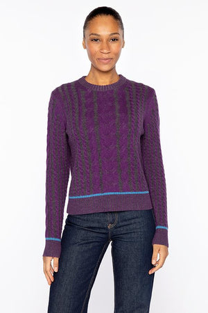 The KINROSS Plaited Tipped Cable Crew Neck Cashmere Sweater features a light pink 100% cashmere cable-knit design with long sleeves and ribbed cuffs and hem, shown on a white background.