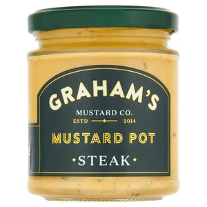 A jar of GRAHAMS - IRISH STEAK MUSTARD is shown. The label displays the brand name "GRAHAM'S" and notes the company was established in 2014. The mustard has a creamy yellow color, perfect as a steak accompaniment, and is contained in a clear jar with a black lid.