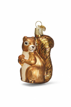 Old World Christmas SQUIRREL ORNAMENT shaped like a squirrel with a bushy tail, holding an acorn.