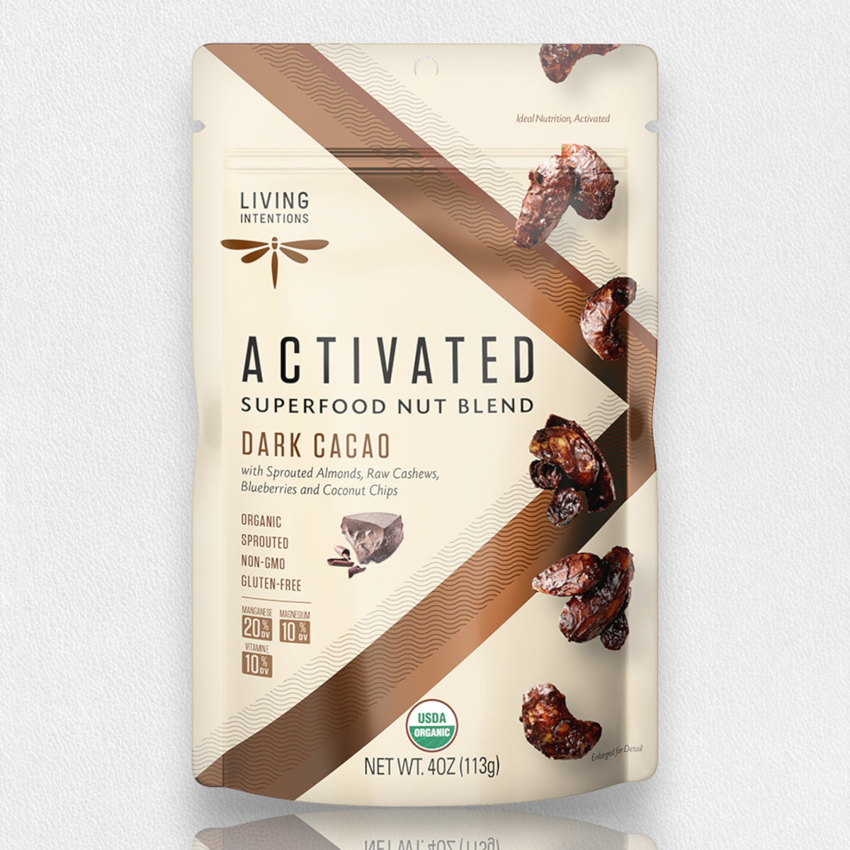 A beige and brown resealable bag of "LIVING INTENTIONS - DARK CACAO NUT BLEND SUPERFOOD" by LIVING INTENTIONS in Dark Cacao flavor. The front of the bag features sprouted almonds, nuts, and chocolate, emphasizing benefits such as being organic, non-GMO, and gluten-free. Net weight: 4oz (113g).