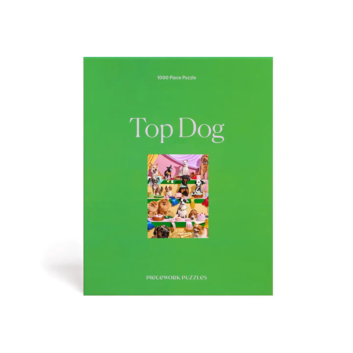 The "Top Dog" by Piecework Puzzles is a green box containing a 1000-piece puzzle. It showcases various colorful dog illustrations, offering the perfect challenge for canine enthusiasts.