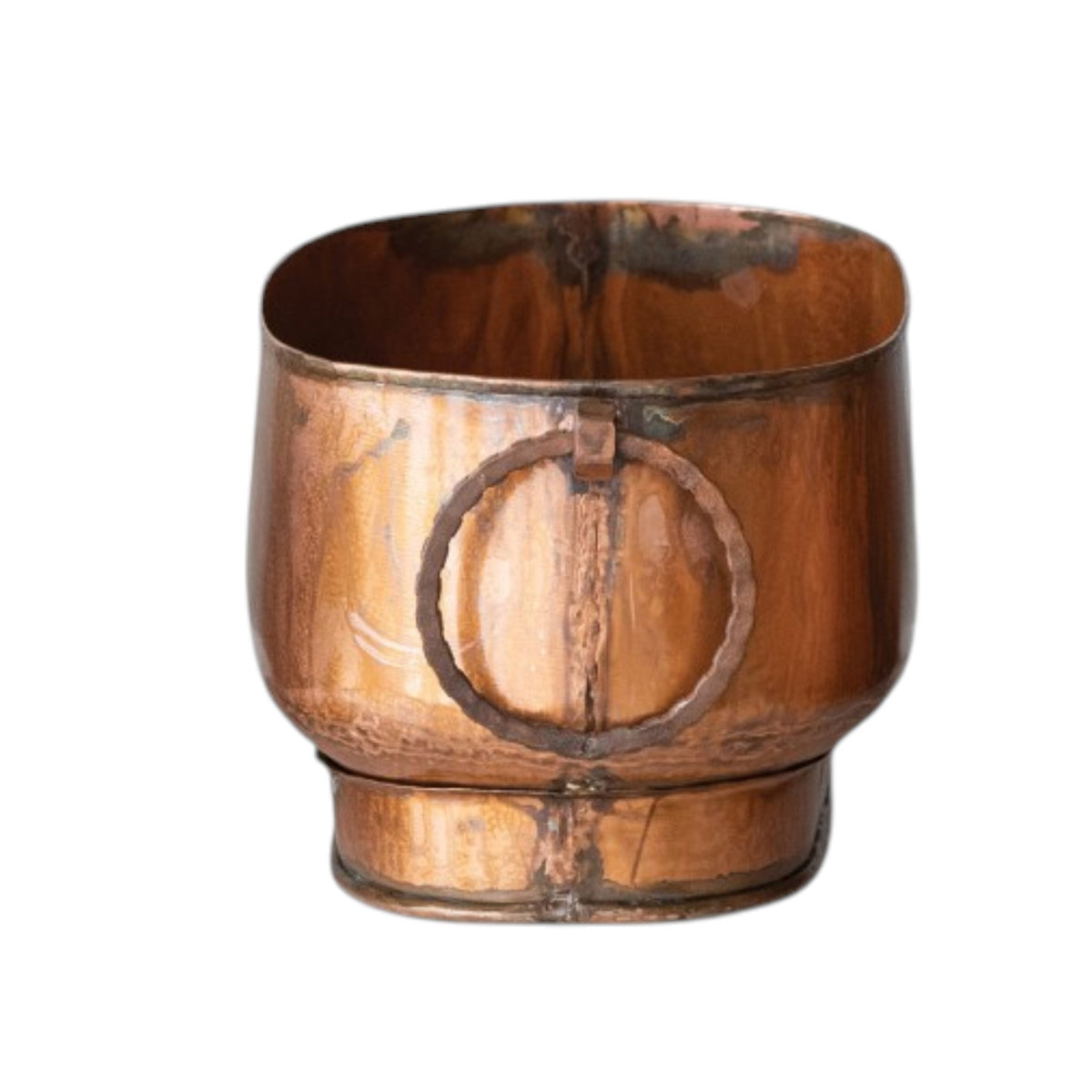 The CREATIVE COOP OVAL METAL PLANTER WITH RING HANDLES, MEDIUM, features an antique copper finish with natural patina—ideal for farmhouse decor and displayed against a white background.