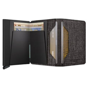 Illustration displaying the SECRID - Slimwallet Palmetto in Brown, expertly crafted by SECRID from refined Palmetto leather. The wallet measures 102 mm in height, 68 mm in width, 16 mm in thickness, and weighs 72 grams. Featuring RFID protection, the wallet is shown from both front and side perspectives.