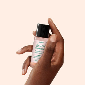 A 30ml bottle of MANUCURIST - GREEN™ DEGREASER nail prep from MANUCURIST INC, formulated with gentle, effective plant-based ingredients. The clear bottle features a black cap and a white label with green and black text.