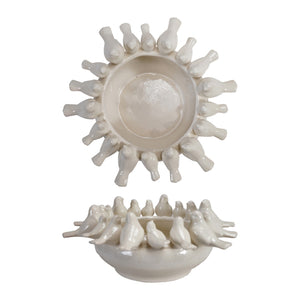 The CREATIVE COOP DECORATIVE STONEWARE BOWL WITH BIRDS ON RIM features charming bird figurines perched along the edge—a lovely accent for farmhouse decor. One bowl is seen from above, the other from the side, highlighting its three-dimensional details.