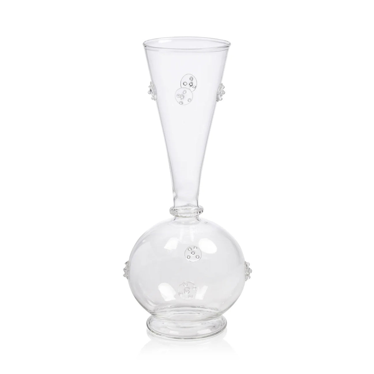 The VENDOME GLASS VASE - LARGE by ZODAX is a clear glass vase with a round base, tall narrow neck, small raised circular patterns, and glass studs. Size: 3.75 in x 9.5 in (9.53 cm x 24.13 cm).