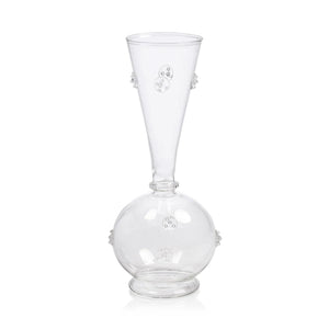 The VENDOME GLASS VASE - LARGE by ZODAX is a clear glass vase with a round base, tall narrow neck, small raised circular patterns, and glass studs. Size: 3.75 in x 9.5 in (9.53 cm x 24.13 cm).