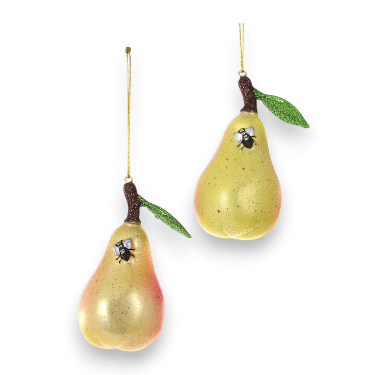 Set of two CODY FOSTER ORCHARD PEAR ORNAMENTS: pear-shaped glass ornaments (2x2x4&quot;), each with green leaves, a glittery finish, gold hanging strings, and a small decorative bee on the fruit.