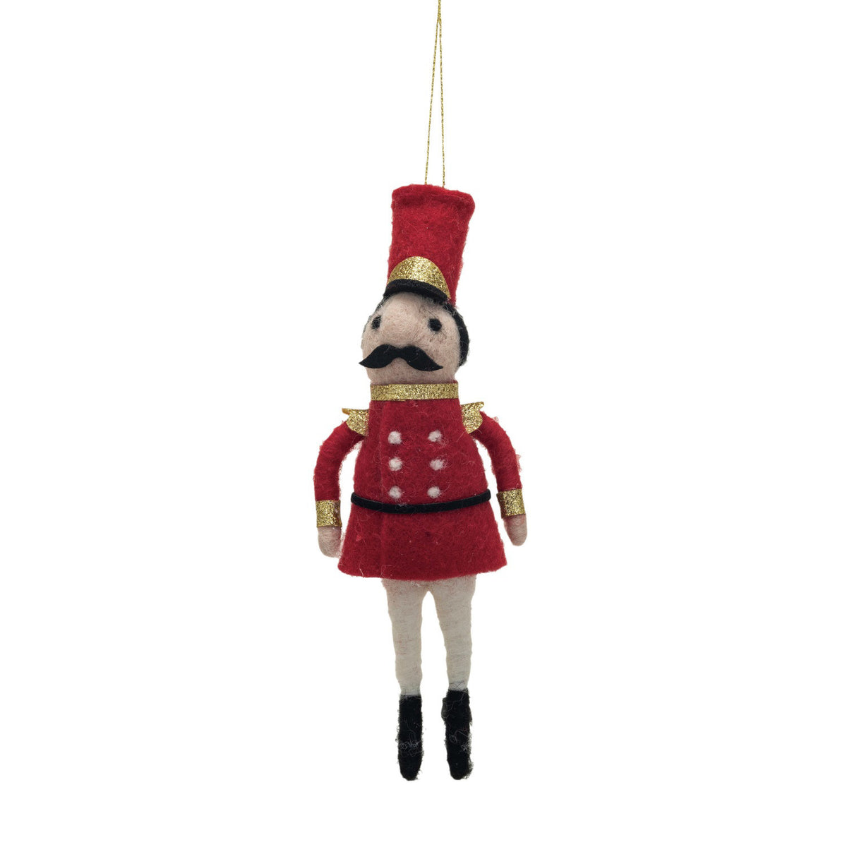 The CREATIVE COOP HANDMADE FELT SOLDIER ORNAMENT features a toy soldier with a tall red hat, gold-trimmed jacket, white pants, black boots, and mustache, hanging by a gold string—an adorable tree decoration.