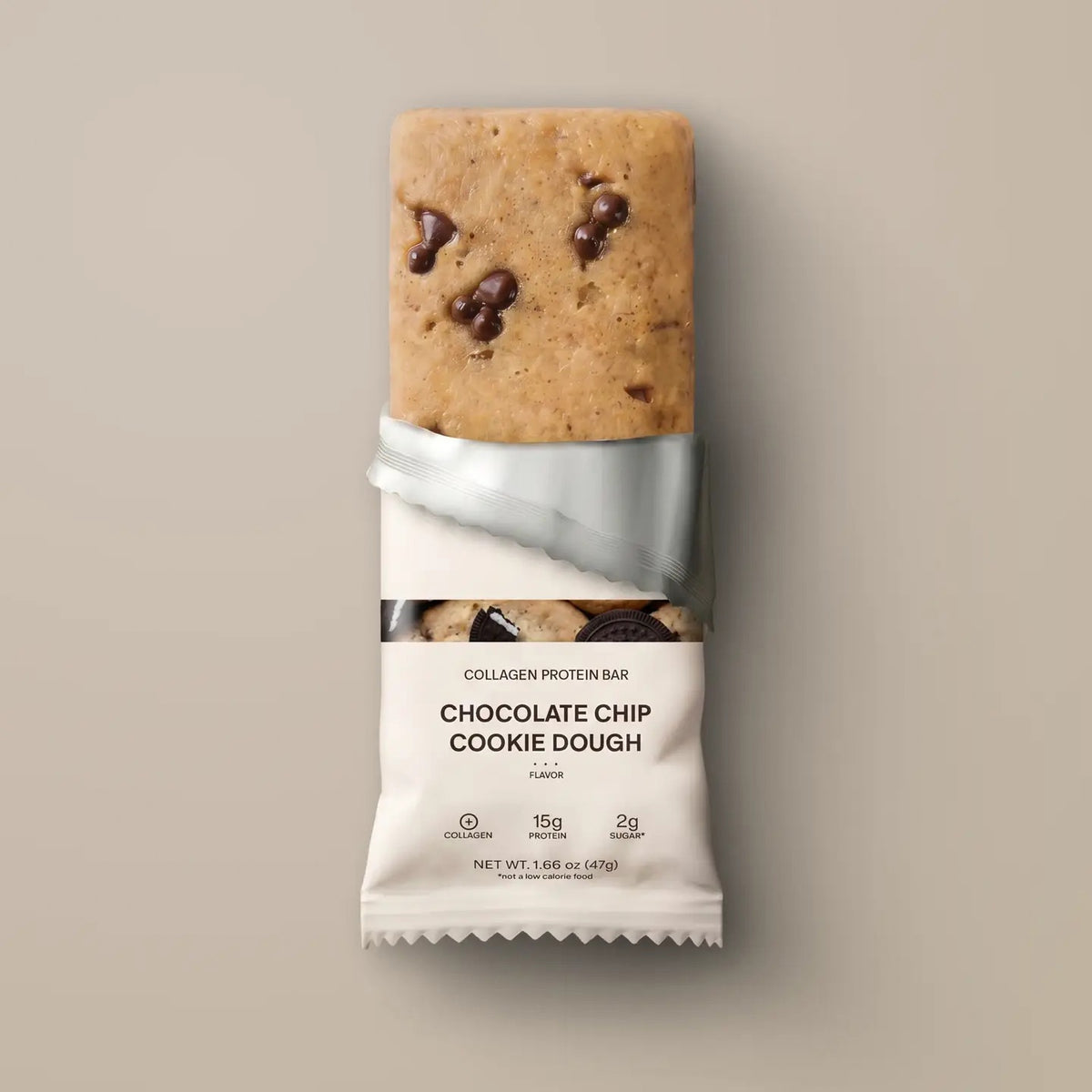 A STARS+HONEY - CHOCOLATE CHIP COOKIE DOUGH protein bar is displayed in white packaging against a neutral background, with the label emphasizing its unique protein blend featuring 15g of protein, only 2g of sugar, and added collagen for a delicious and nourishing snack.