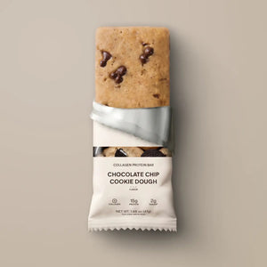 A STARS+HONEY - CHOCOLATE CHIP COOKIE DOUGH protein bar is displayed in white packaging against a neutral background, with the label emphasizing its unique protein blend featuring 15g of protein, only 2g of sugar, and added collagen for a delicious and nourishing snack.