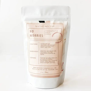 A white stand-up pouch from "Native Nectar" labeled "No Worries Salt Soak" features mineral-rich Dead Sea Salts and contains 12 oz (340g) of product. The packaging, with directions and cautions on the back, aims to reduce muscle soreness and soothe with calming essential oils.