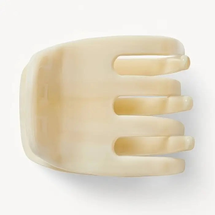 The MACHETE - MINI CLAW by MACHETE is an Italian acetate hair clip in a brown and beige tortoiseshell pattern, featuring a rounded top and multiple curved gripping prongs, shown against a plain white background.
