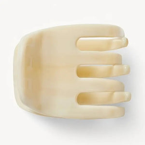 The MACHETE - MINI CLAW by MACHETE is an Italian acetate hair clip in a brown and beige tortoiseshell pattern, featuring a rounded top and multiple curved gripping prongs, shown against a plain white background.