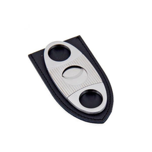 The BEYBERK INTERNATIONAL STAINLESS STEEL CIGAR CUTTER features double finger holes and a central blade opening, shown beside its sleek black leather pouch.