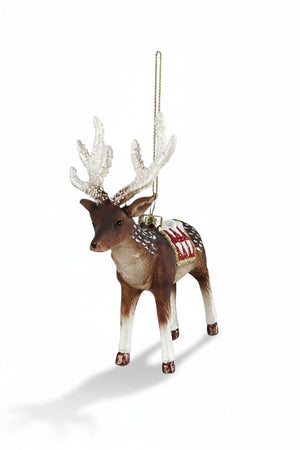 DEER ORNAMENT WITH GLITTER shaped like a hanging deer with white glitter-covered antlers and a red and white saddle.
