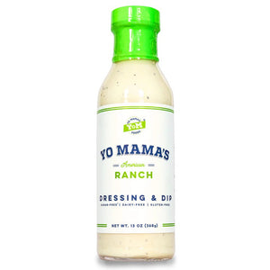 A bottle of YO MAMA'S - AMERICAN RANCH from YO MAMA'S FOODS is displayed against a white background. The green-capped bottle, labeled "dairy-free, gluten-free," and "no sugar added," contains 13 oz (368g) of hand crafted Ranch Dressing & Dip.