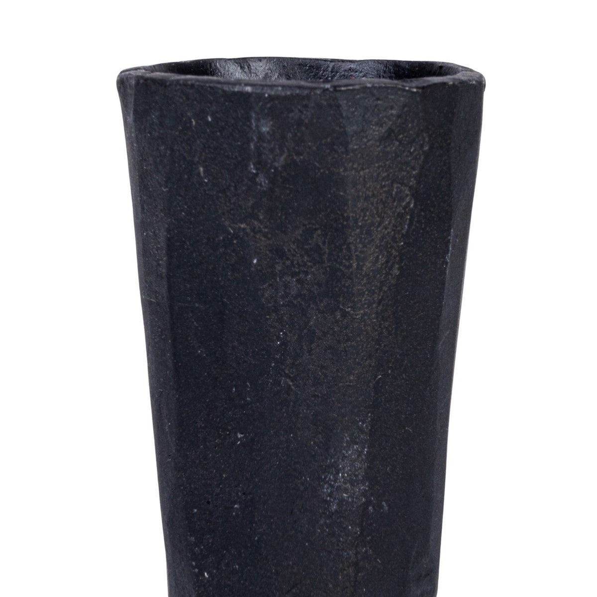 The CREATIVE COOP HAND-FORGED CAST IRON TAPER HOLDER in black features a hammered texture, wide flared base, and slender cylindrical top—ideal for industrial decor and shown upright against a plain white background.
