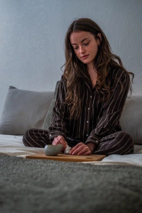 A set of MADISON GREEN - REST YOUR EYES ON THE BED relaxing eye masks and a small jar, all packaged in minimalist white with light brown text, displayed against a plain white background.