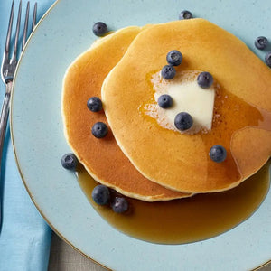 A yellow resealable 907g (32oz) pouch of CUP4CUP Gluten Free Pancake & Waffle Mix features white and blue text, "Gluten Free" label, and is ideal for making pancakes or gluten-free waffles.