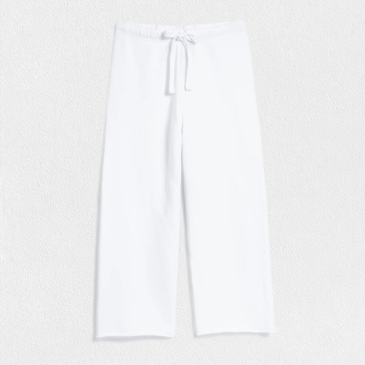 A pair of the FRANK AND EILEEN Catherine Favorite Sweatpants in white, showcased against a textured white background. These comfortable drawstring pajama pants by Frank &amp; Eileen feature a simple design with straight legs and an adjustable waist tie for optimal comfort.