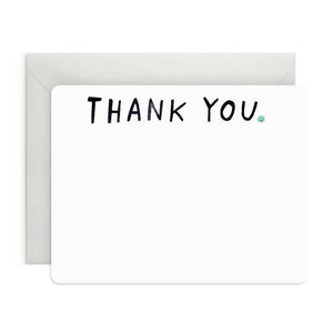 A set of 8 E. FRANCES PAPER "THANK YOU" flat notes features elegant watercolor designs with bold black lettering. Each card comes with an envelope, wrapped in a light green band labeled "E. Frances.