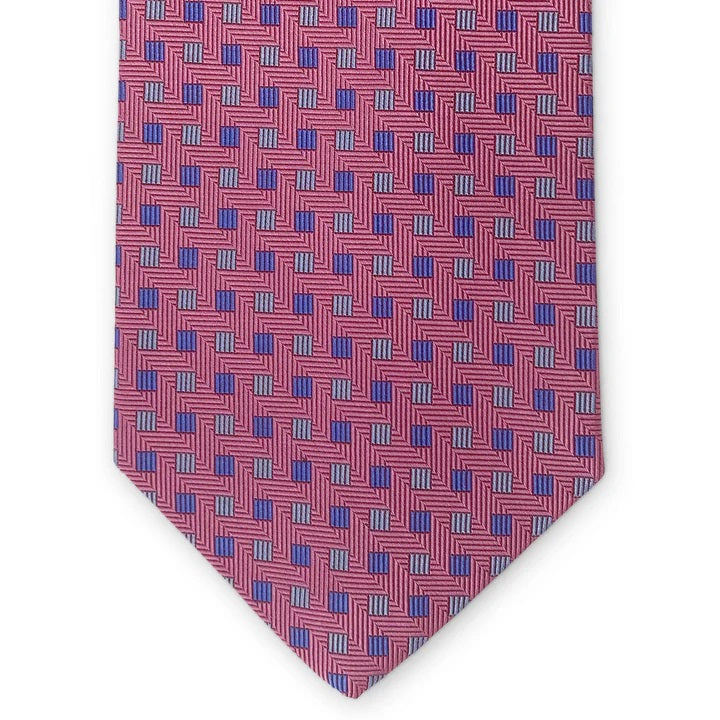 The BIRD DOG BAY PETER-BLAIR - BESPOKE SMALL SQUARES SILK TIE IN PINK is a handmade New York tie featuring a pink woven silk with repeating blue and purple squares on a white background.