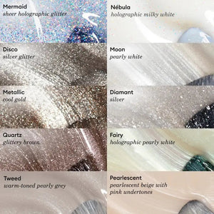A transparent glass bottle of MANUCURIST - GREEN™ Nail Polish in Disco by MANUCURIST INC contains a sparkling silver glitter vegan polish. The bottle features a black cap and a white label adorned with green and black text.