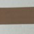 A blurry image shows the MILVA MI Cotton Poplin Dress by MILVA, featuring biscotto tan and white stripes in three horizontal bands—white at the top and bottom, and a wide tan band in the center.