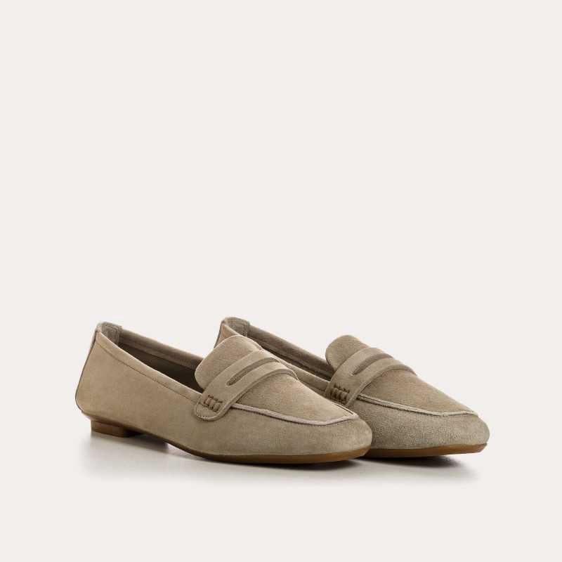 The REQINS HEMA suede loafers in Cactus feature a classic penny slot detail, leather insole, and visible toe stitching, shown against a white background.