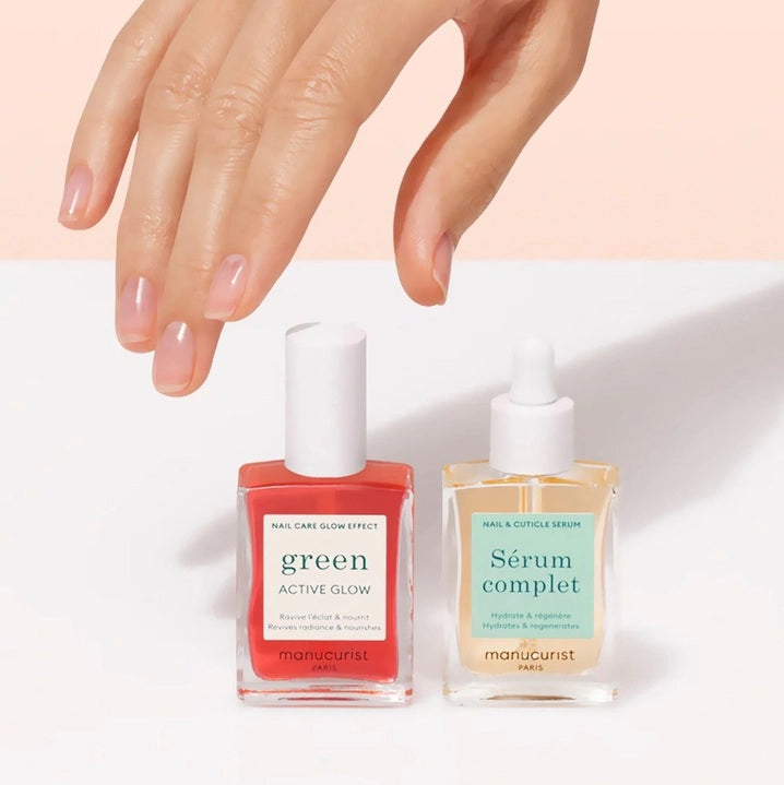 The MANUCURIST - HEALTHY GLOW DUO SET by MANUCURIST INC includes two nail care essentials—Sérum Complet and Green Active Glow—specially formulated to hydrate, regenerate, and nourish your nails for a revitalized appearance.