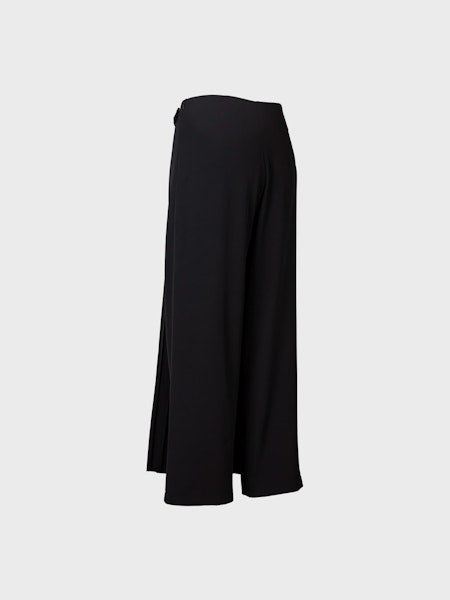 The SANDRO FERRONE TROUSER WITH PLEATED FRONT PANEL features a pleated front, waistband, and belt loops, shown against a light gray background. Made in Italy.