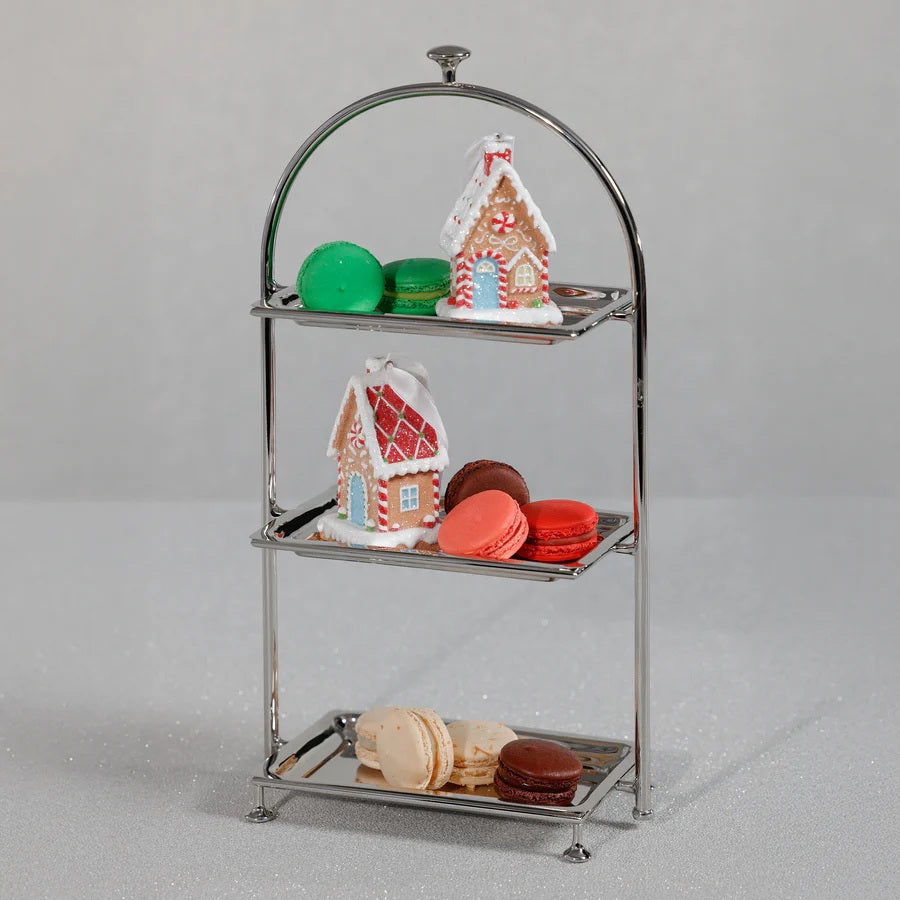 The HIGH TEA 3-TIER STAND, POLISHED NICKEL by ZODAX features rectangular trays and an arched handle, making it a modern serving piece ideal for displaying or serving pastries and snacks at elegant gatherings.