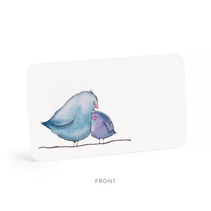 A clear plastic box holds 85 "Birdie Love Little Notes" by E. Frances Paper, each capturing the essence of "Birdie Love," with a front card watercolor of a large blue bird and a small purple bird perched on a branch.