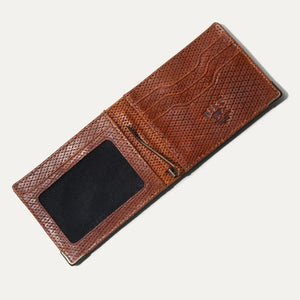 The WILL LEATHER GOODS Industrialist Billfold in Ginger Pindot is shown closed on a white background, featuring full-grain leather and a subtle embossed animal logo at the top right corner.