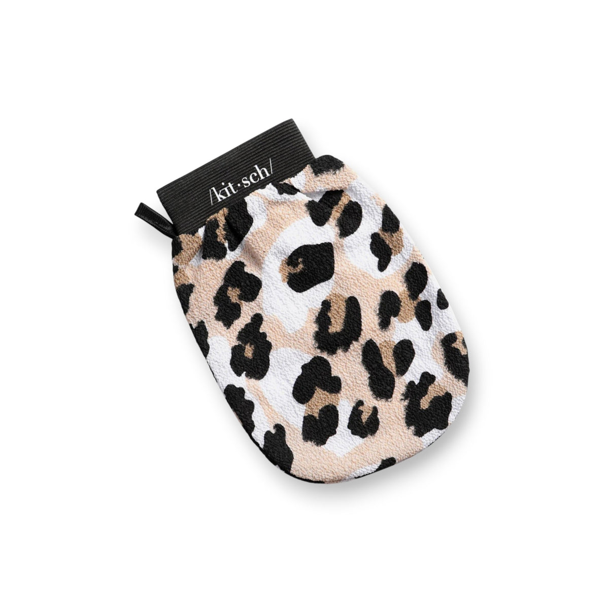 The KITSCH Eco-Friendly Exfoliating Glove boasts a leopard print with black spots on a beige and white background, designed perfectly for bath or shower scrubbing. It features a convenient black tag with white text at the top.