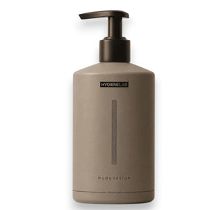 A four-part image showcases the HYGIENELAB - BODY LOTION, UNSCENTED, spotlighting key ingredients Tocopherol, Squalane, and Aloe Barbadensis along with their skin benefits. The composition features a “Clean Non-Toxic Formula” bottle from HYGIENELAB bearing a health certification badge. This dermatologist-approved body lotion is also EWG Verified, ensuring your peace of mind.