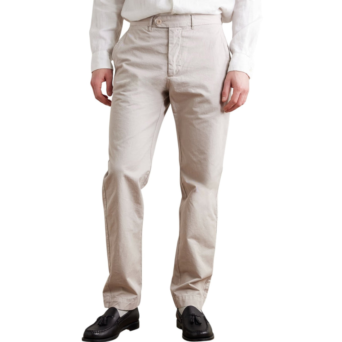 A close-up of the HARTFORD - TAYLOR PANTS IN STONE shows a buttoned back pocket, belt loop, and visible stitching on the waistband of these straight-leg men's pants.