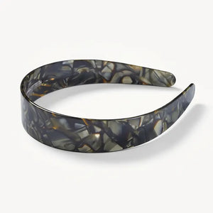 The MACHETE - Wide Headband in Midnight Horn features a glossy, black and gray marbled Italian acetate design and is displayed on a white background.