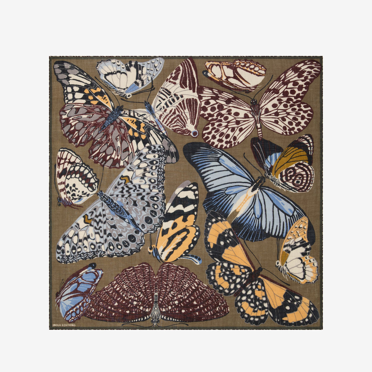 The INOUI EDITIONS - PAPILLONS WOOL SCARF IN KHAKI by INOUI is a square scarf made in India, featuring an intricate and colorful butterfly pattern in brown, blue, yellow, and white hues on a tan background. Measuring 130 x 130 cm, it provides generous coverage and stylish versatility for any occasion.